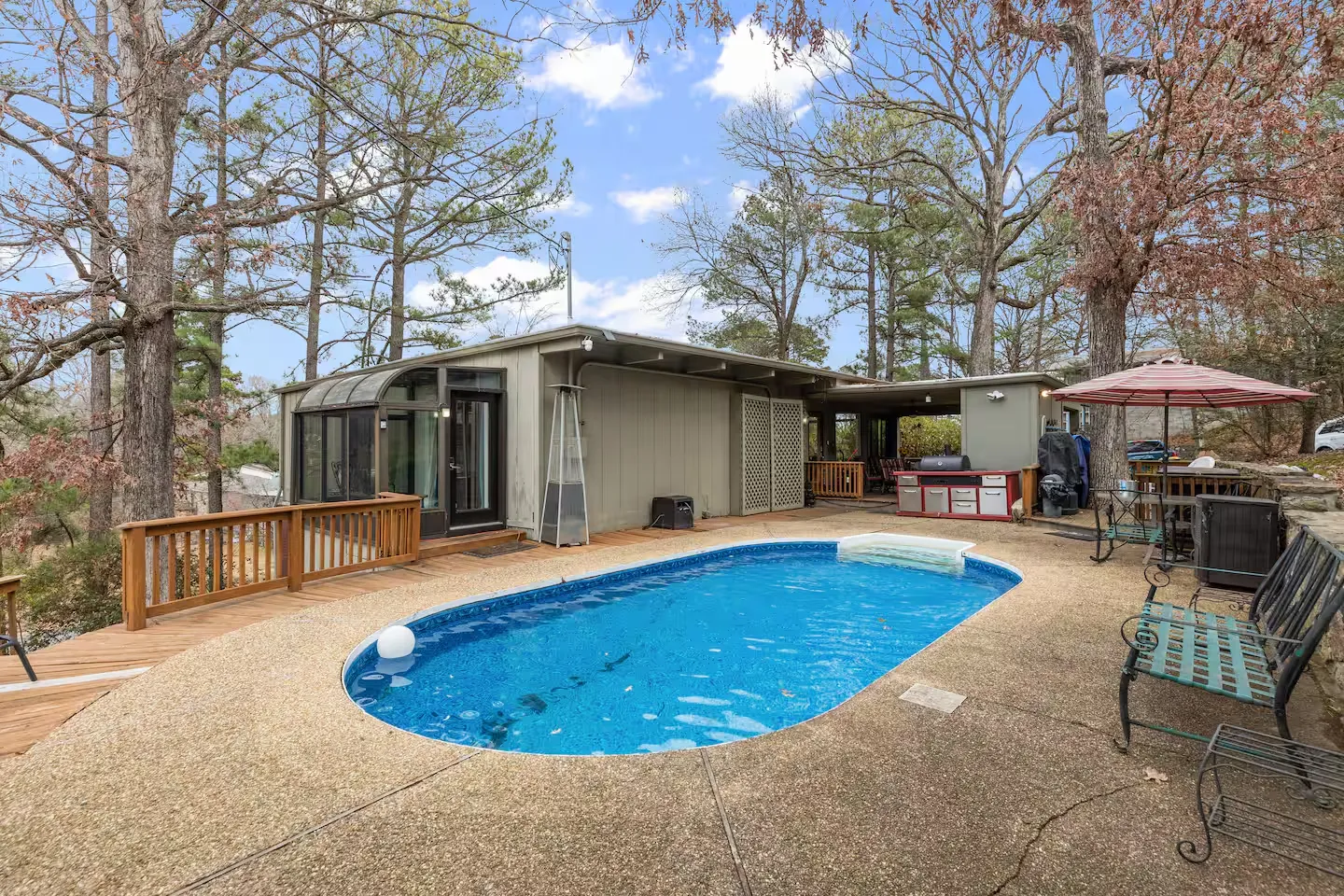 Private inground pool and gazebo with outdoor TV at Little Rock vacation home